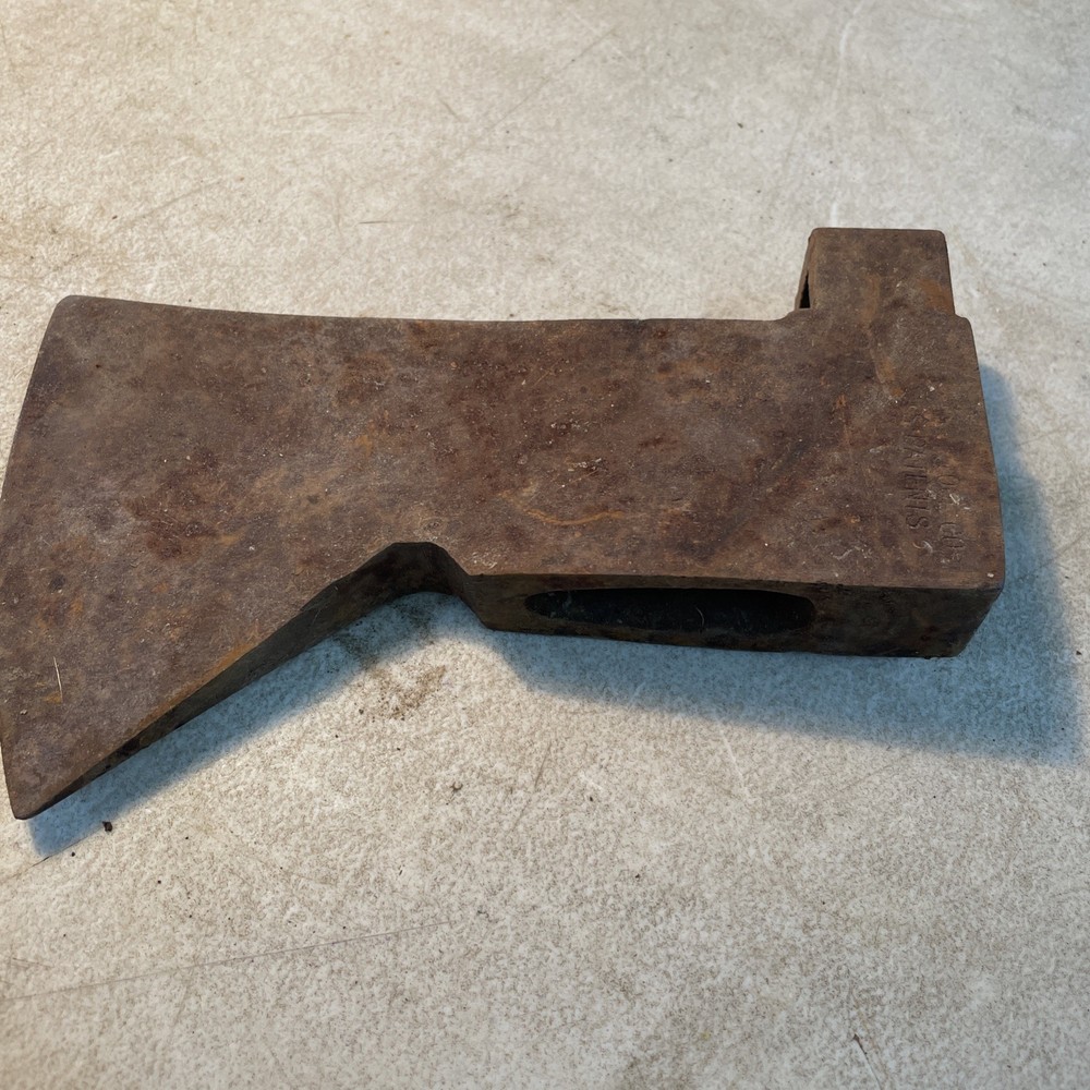 Vintage axhead with tool holder
