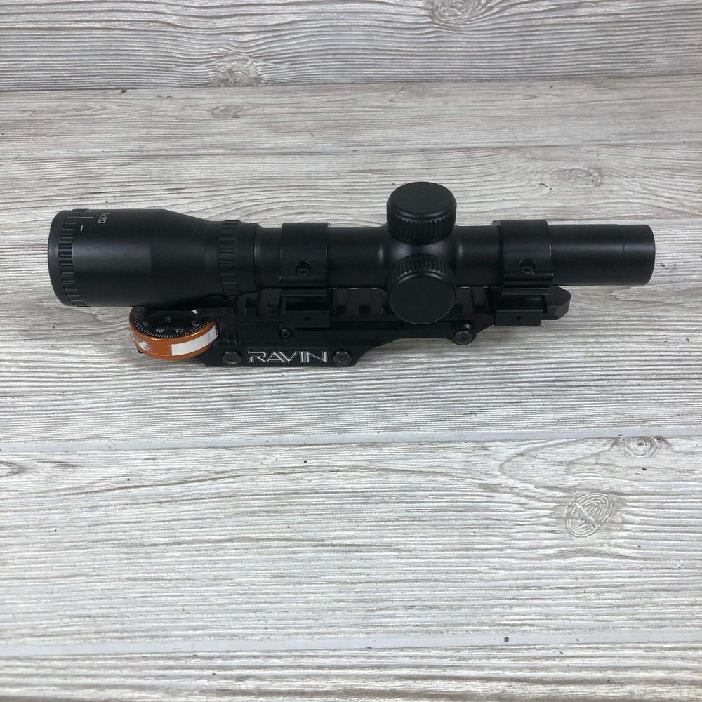Used Ravin Jack Plate with 1X ( zero power) scope