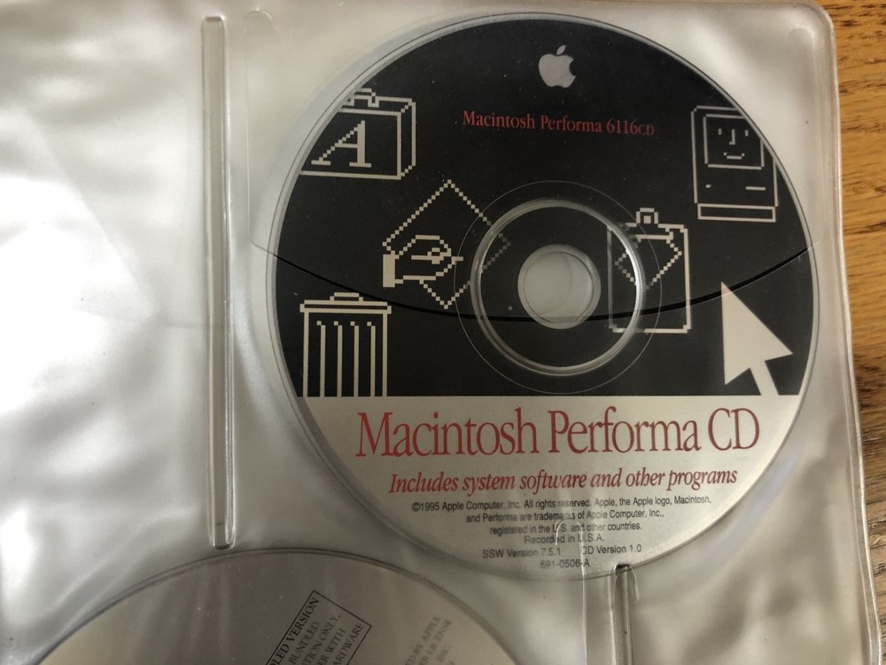 Macintosh Compact Discs Holder and random Discs / Macintosh Computer Software
