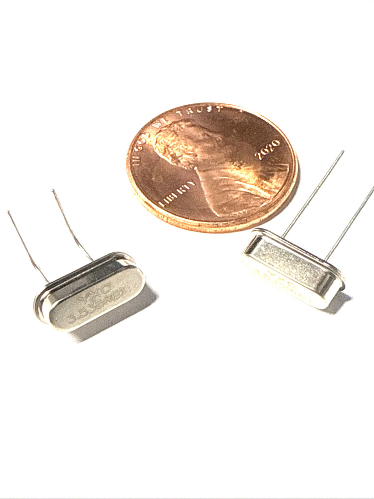 2 pcs 7.035 MHz Crystal. HC49/S
