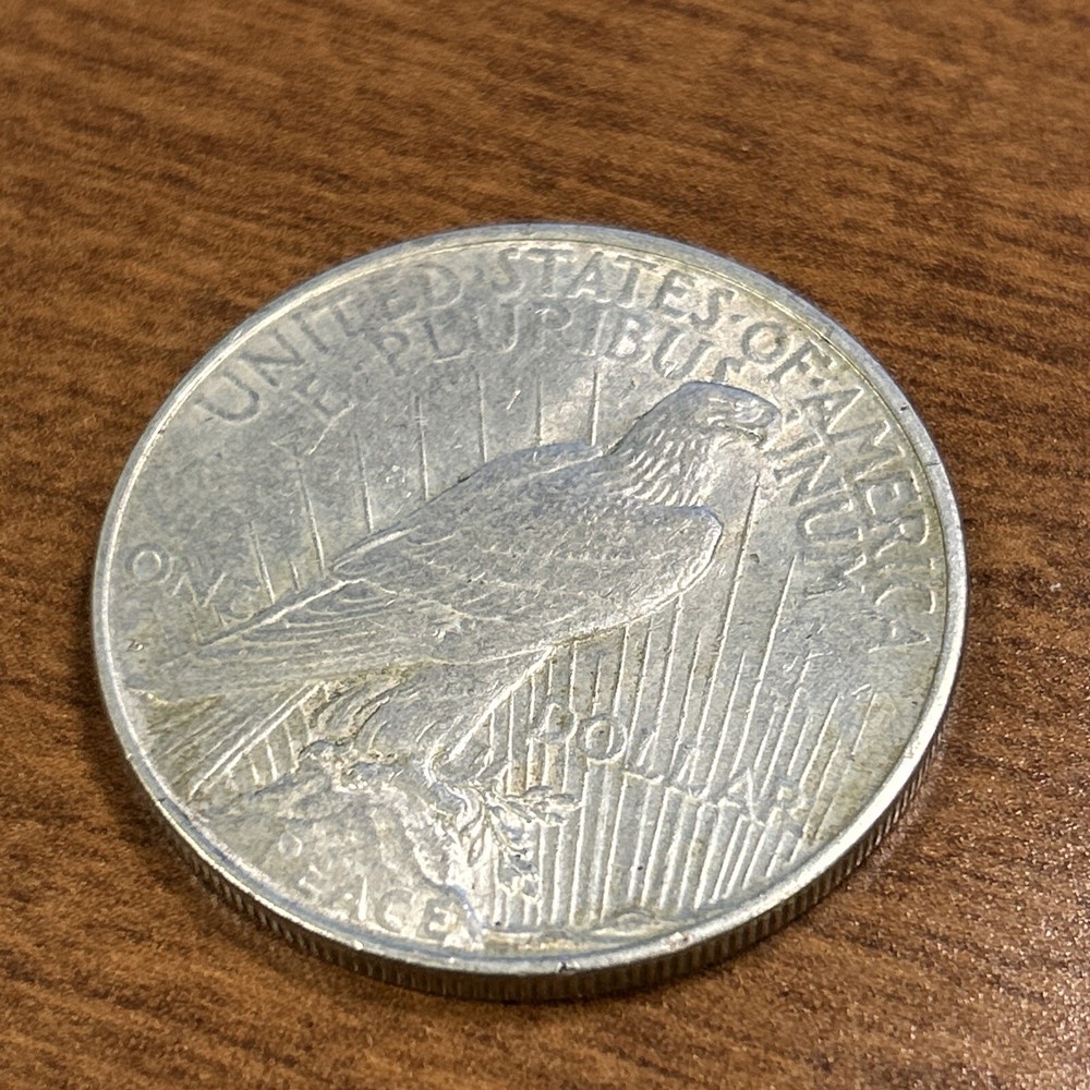 1927-D $1 Peace Silver Dollar AU+