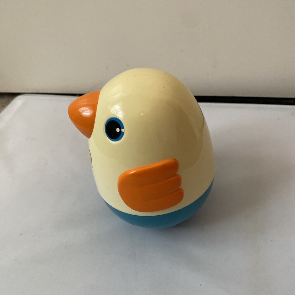 Vintage Musical Roly Poly Penguin pull behind toy