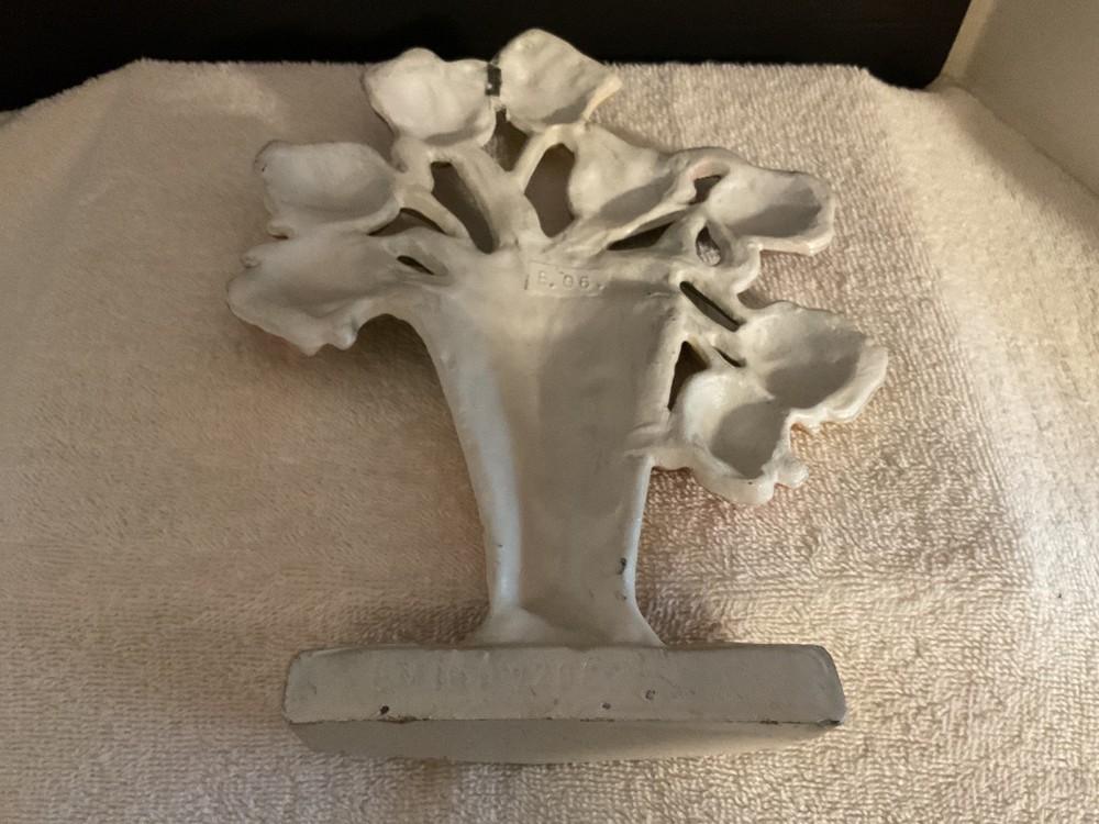 Vintage John Wright Cast Iron Tulip Doorstop