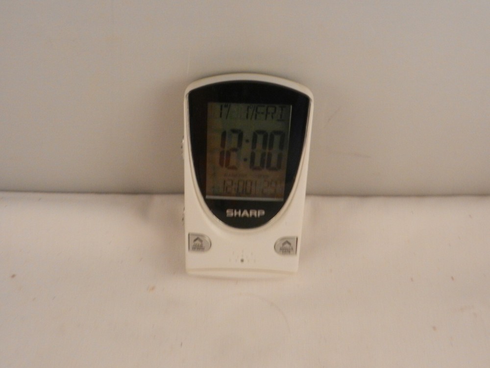 SHARP TRAVEL ALARM CLOCK "WORKS" WITH BATTERY