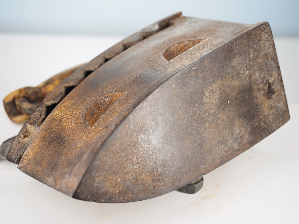 Antique cast iron coal fired clothing iron