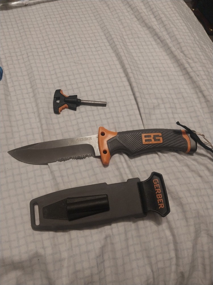 Gerber Bear Grylls Ultimate Survival Knife with firestarter.