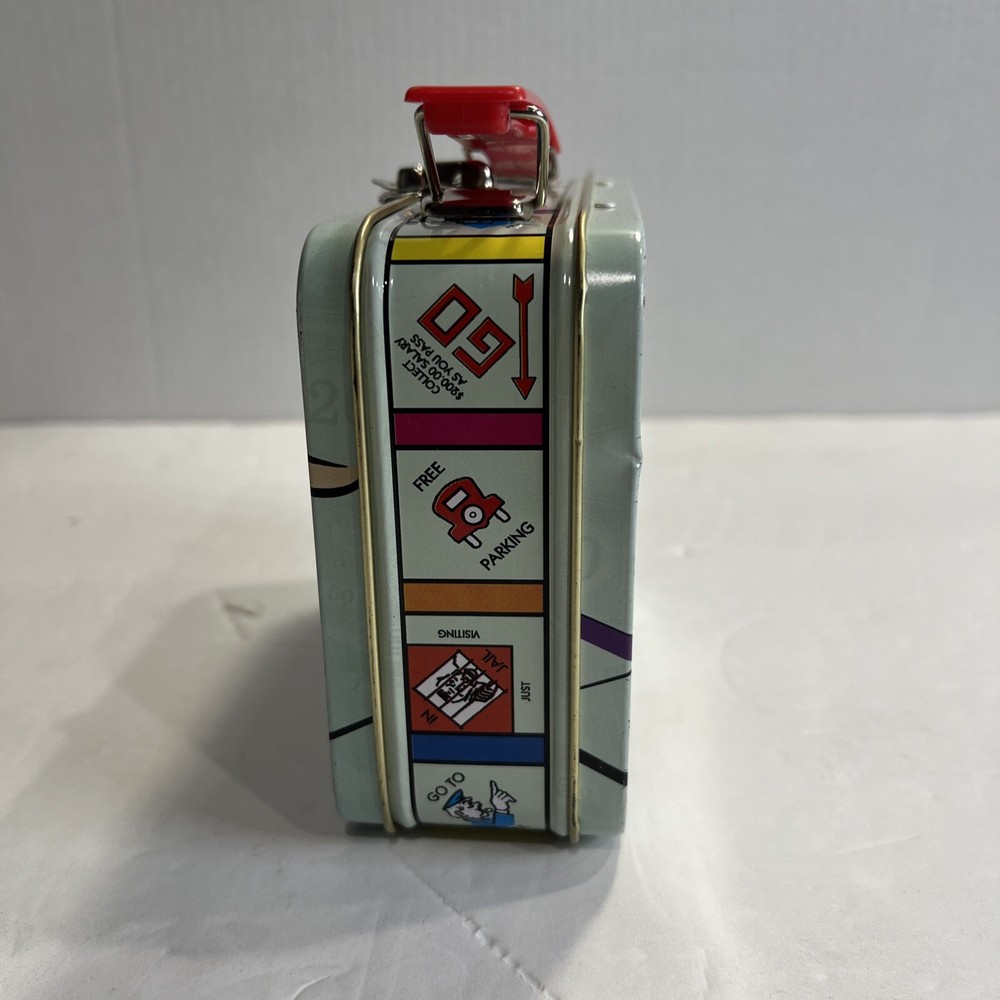 2000 HASBRO MINI MONOPOLY "ADVANCE TO GO" TIN CARRYING CASE