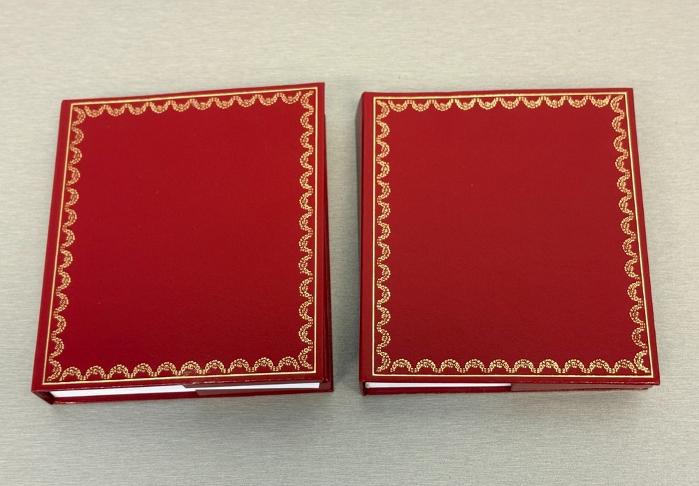 Two Cartier Original Certificate & Instruction Booklet's