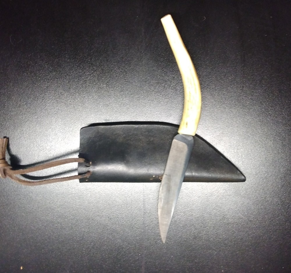 Unique handmade 8" knife in leather sheath