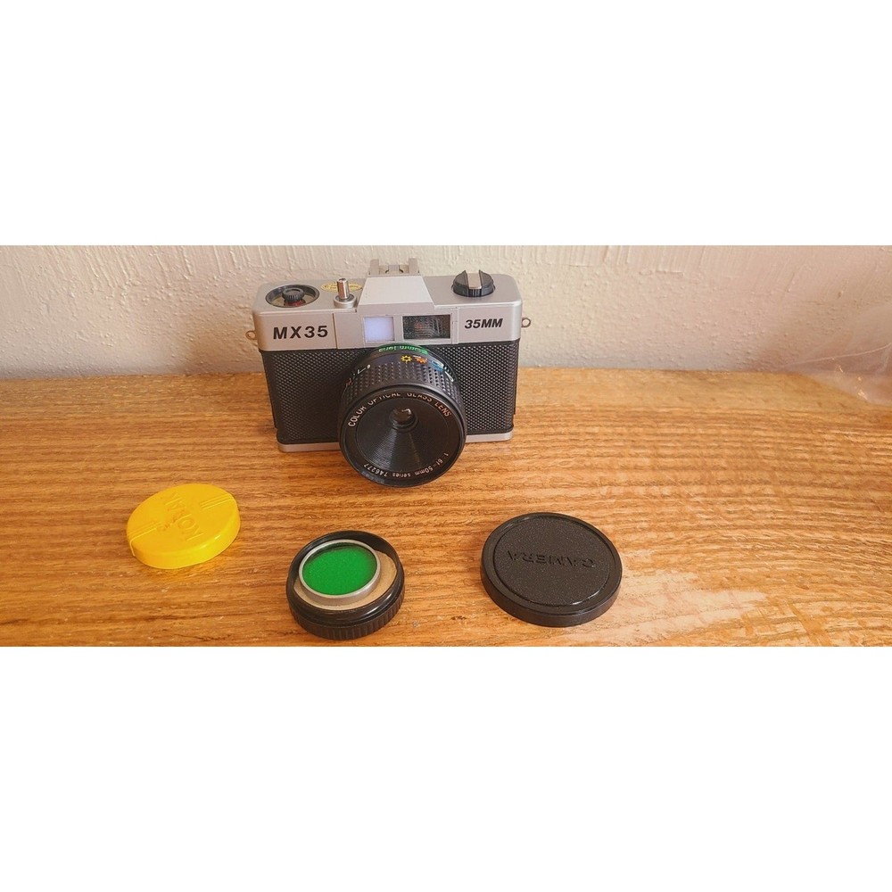 Vintage camera and green filter