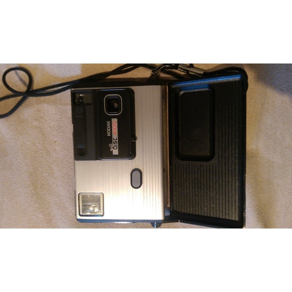 Camera Bundle - Kodak Disk 4100 Camera, Rokinon 35mm, Polaroid Flashgun #268
