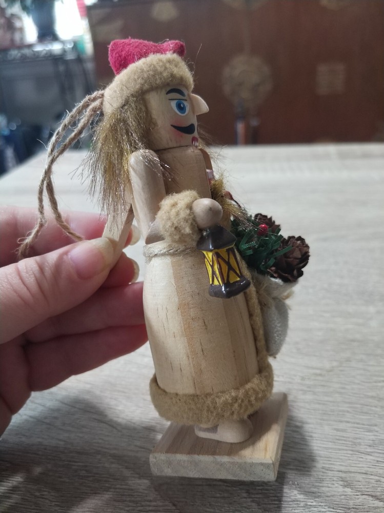 Handcrafted, painted wood Christmas nutcracker ornament
