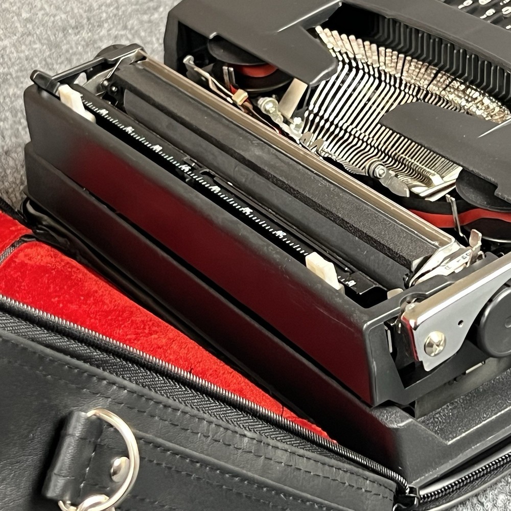 Generation 3000 Manual Typewriter with Case and Paperwork