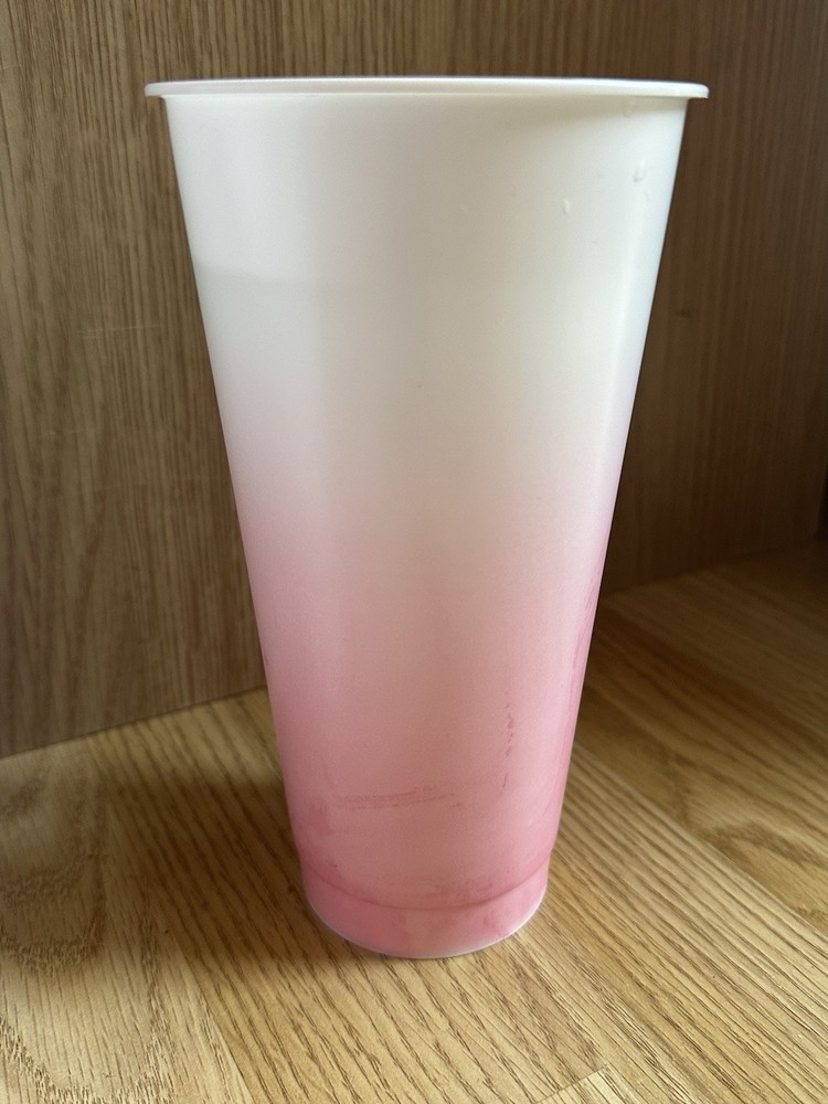 Cold Cup With Straw And Lid Colour Changing From White To Red Ombré Effect