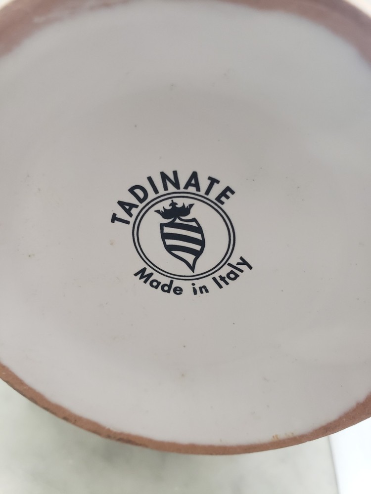 Hand painted, signed, ceramic pitcher,