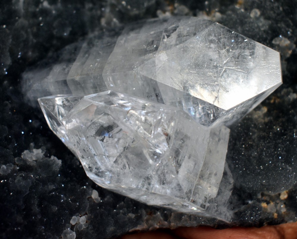POINTED APOPHYLLITE CRYSTALS WITH BLACK CHALCEDONY CORAL BASE