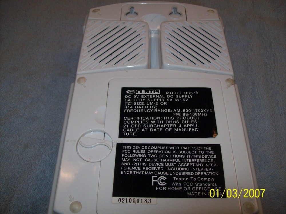 CURTIS MODEL RS57A PORTABLE COMPACT CD PLAYER