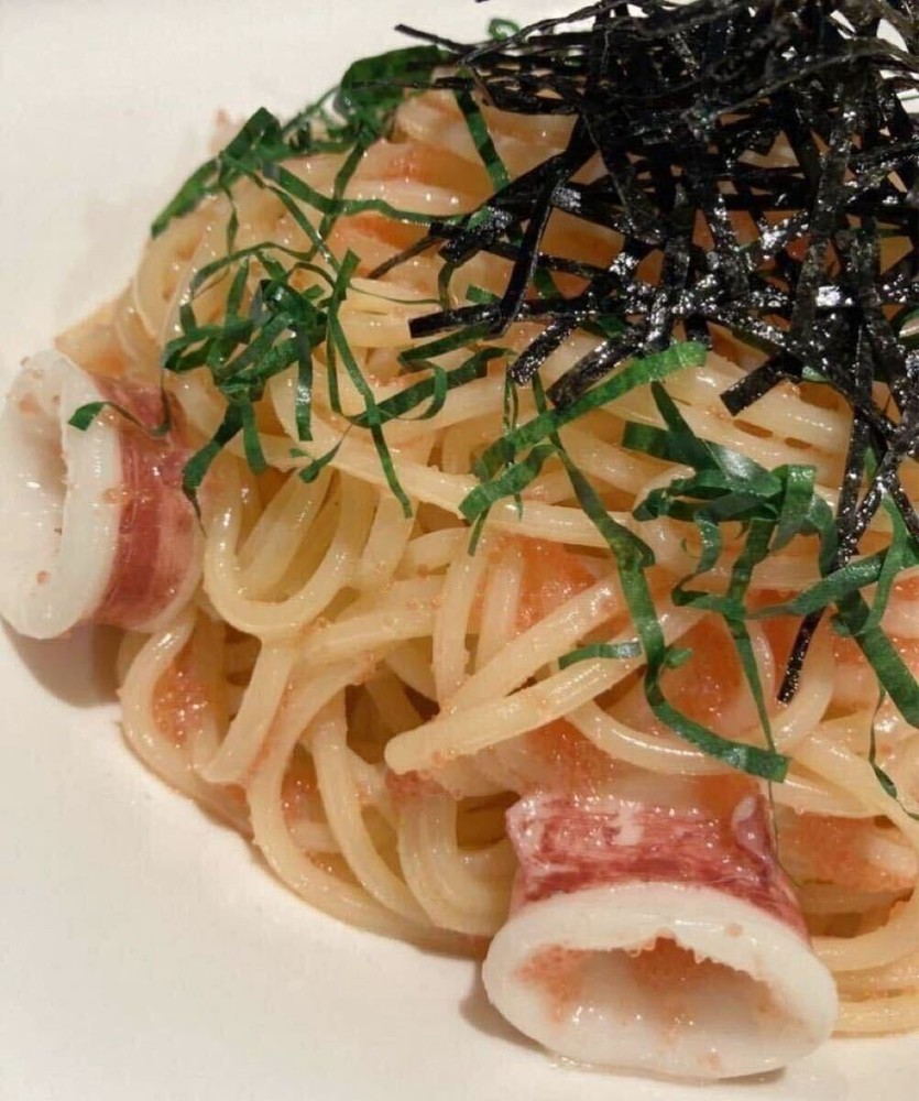 Food replica squid and cod roe pasta with plate