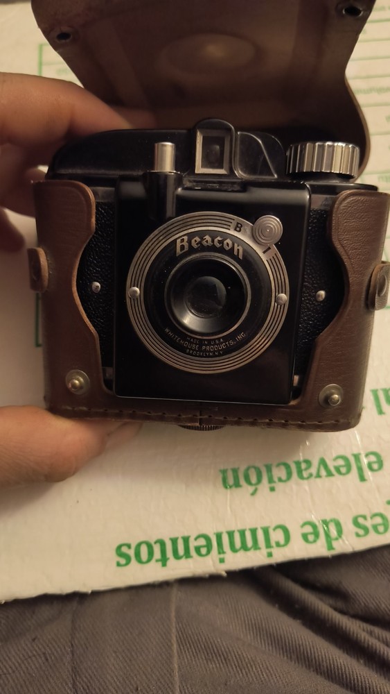 vintage becon camera with leather case