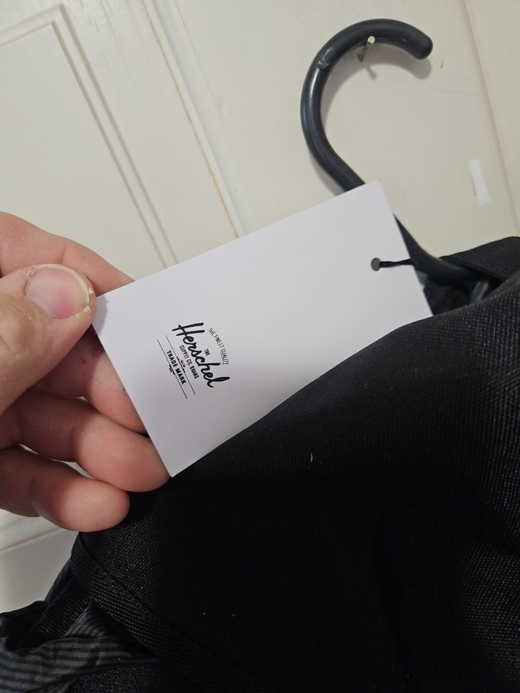 Herschel Black Backpack with Buckle Straps