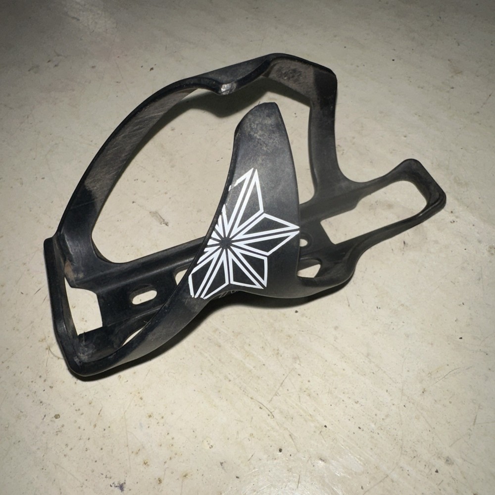 Supacaz Tron Poly Bottle Cage Black Side Loader Right Hand Load White Graphic