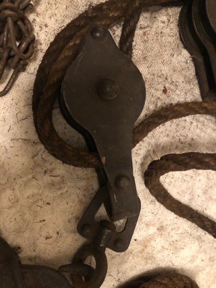 Antique primitive rope and chain hoist