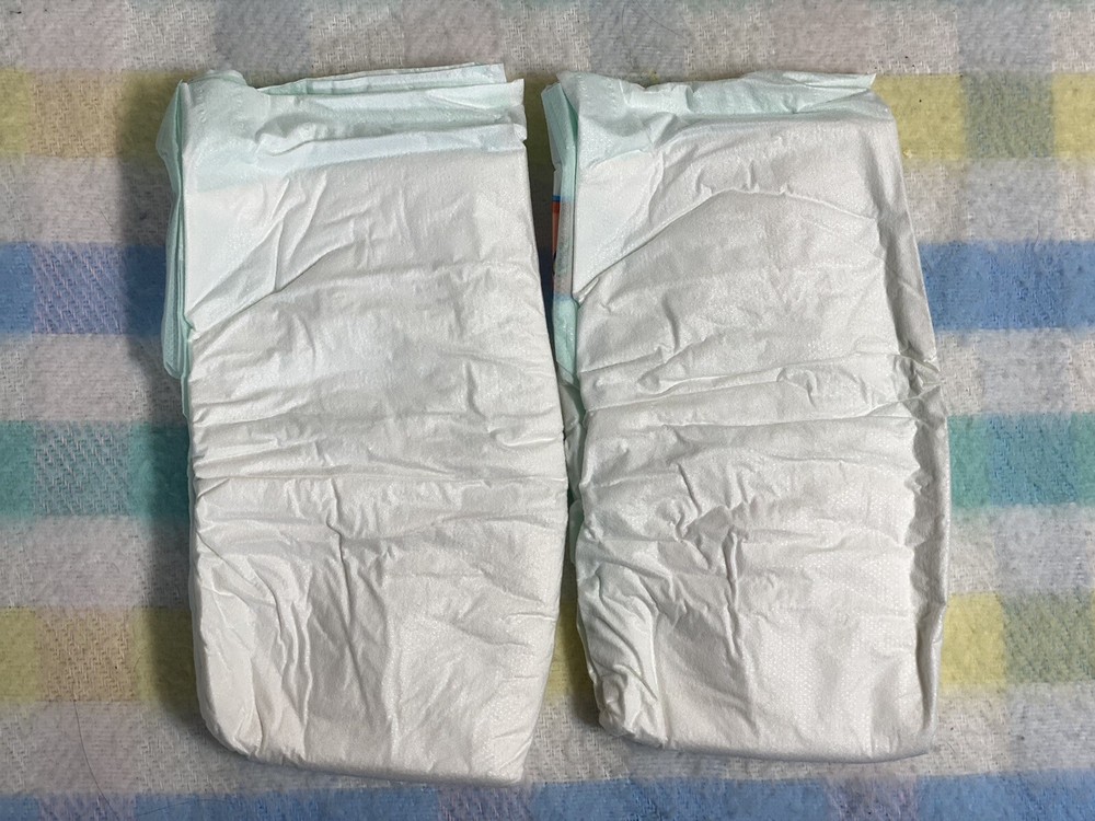 Vintage Tape Tab diapers Medium/Large 4 Count