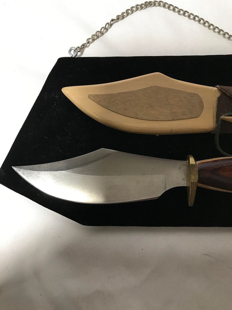 Bowie Knife & sheath, on display rack