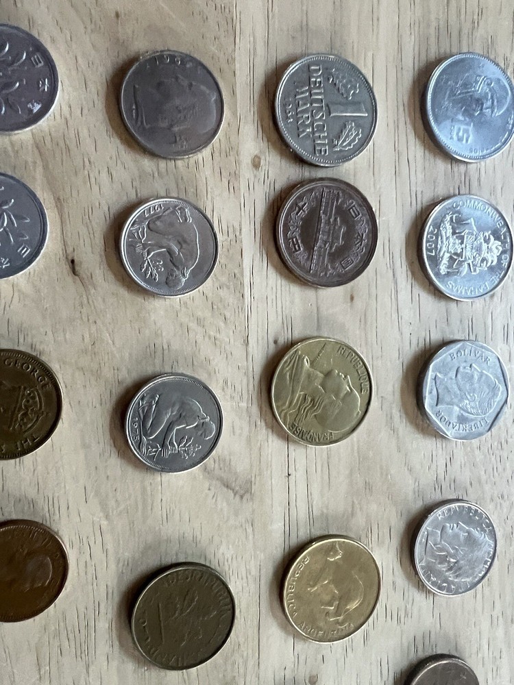 Assorted foreign coins. 26 Coins In Total