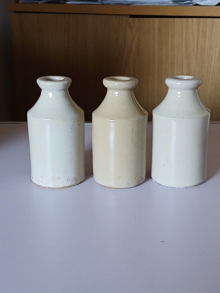 3 Old Off White Stoneware Bottles