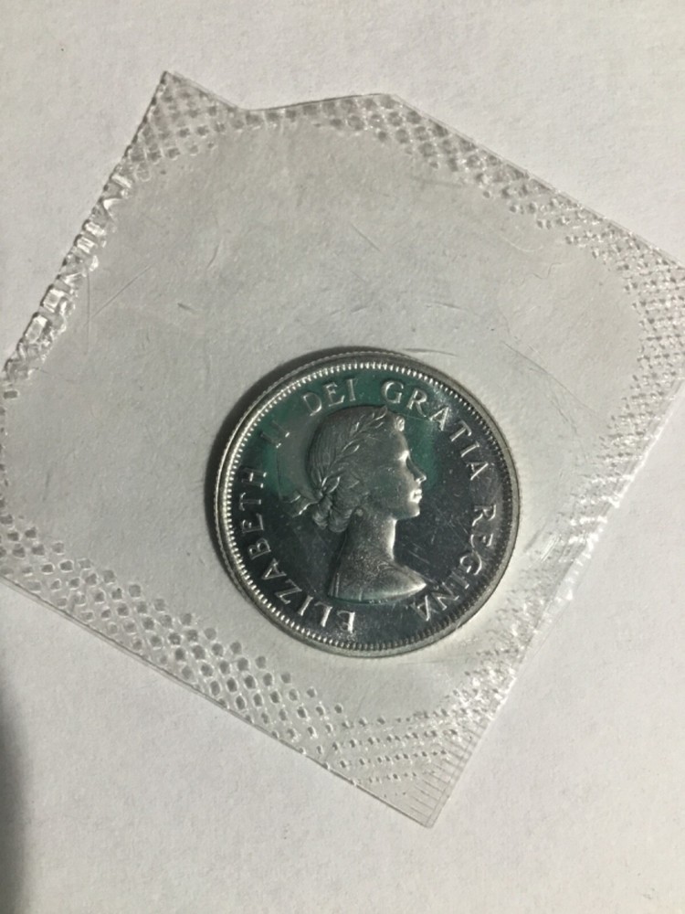 1964 CANADA .800 silver quarter GEM BU in mint cellophane