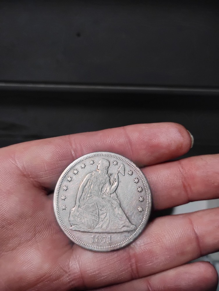 1871 seated dollar XF condition