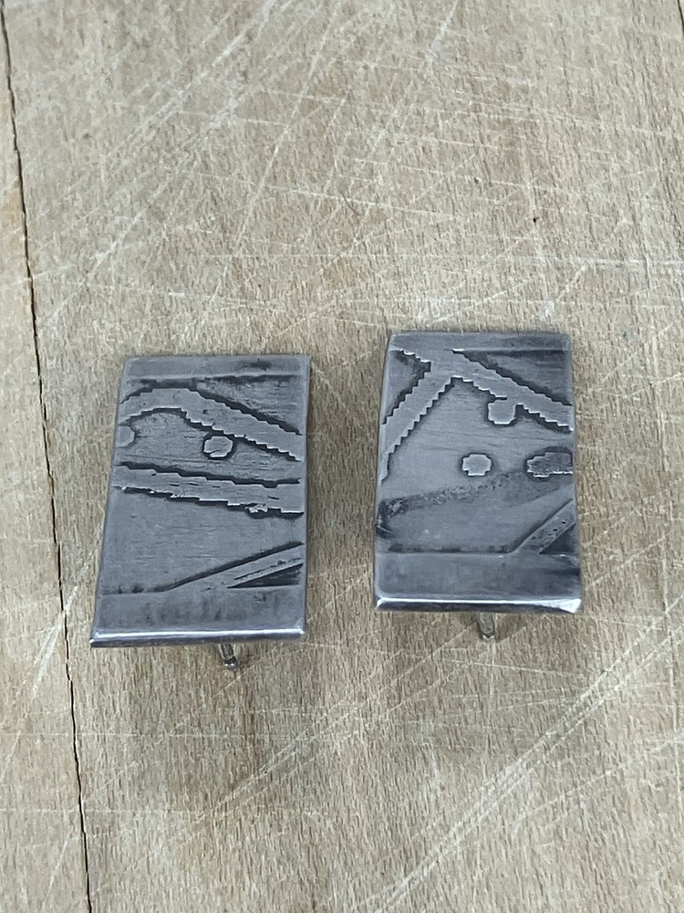 Handcrafted sterling silver studs featuring oxidized Southwestern Style Native