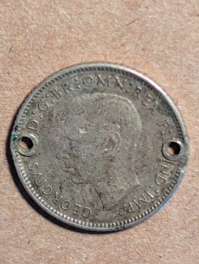 1943-D Australia 6 Pence Silver(Holed)