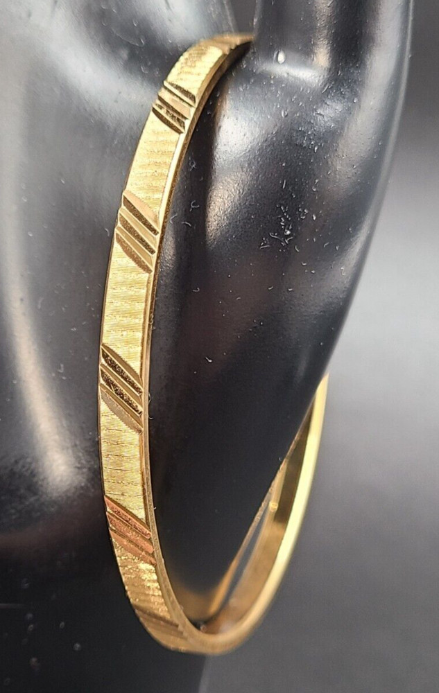Monet Gold Tone Bangle Bracelet Etched Design Signed