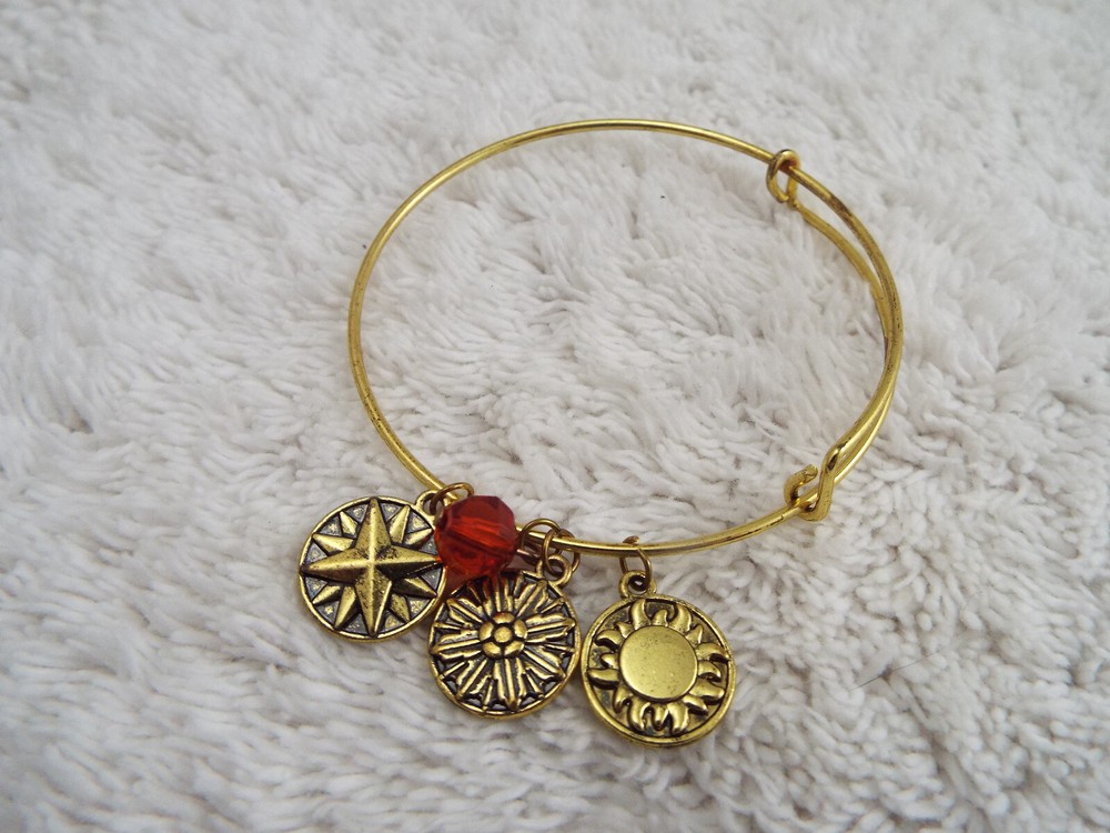 Goldtone Star Sun Charm Expandable Bracelet