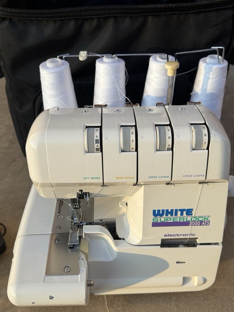 White Superlock Electronic 2000 ATS Serger w/ Rolling Case