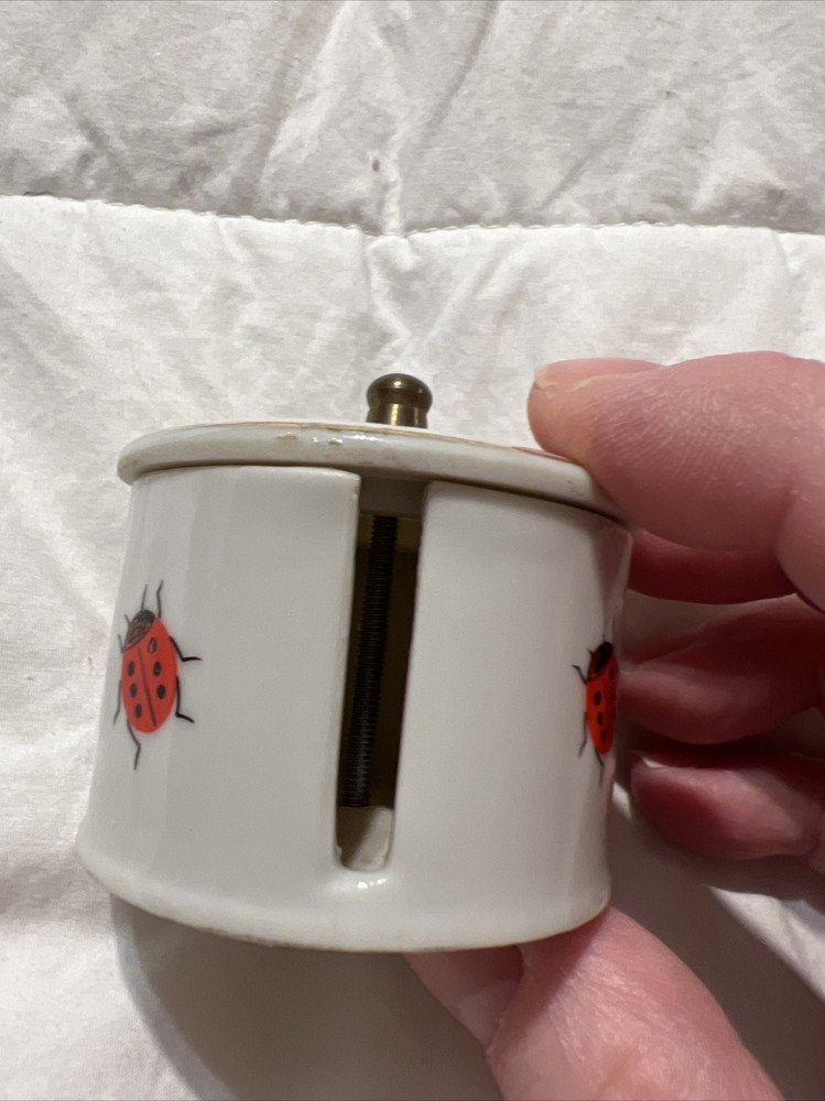 Vintage ladybug stamp holder