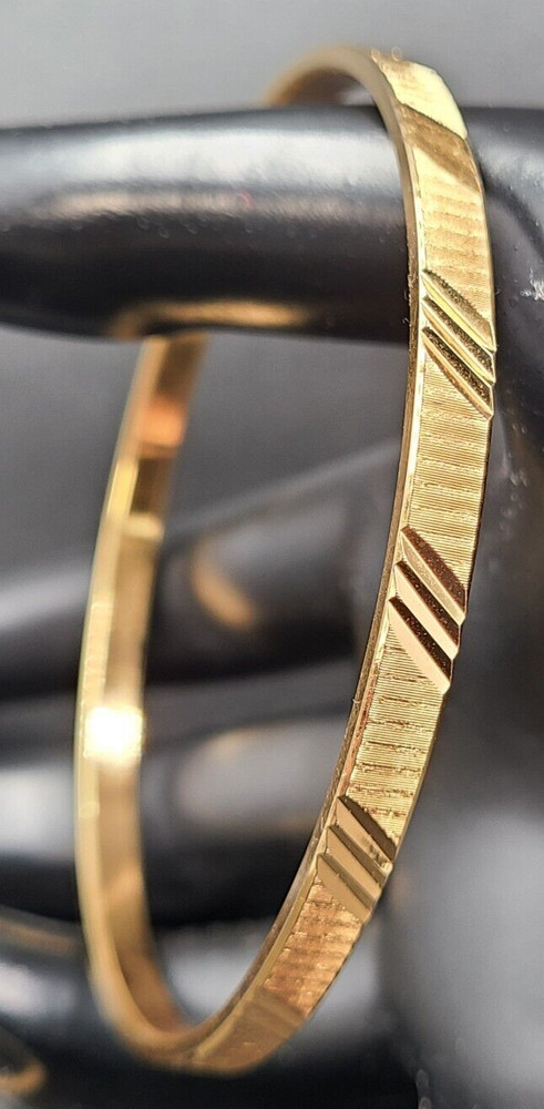 Monet Gold Tone Bangle Bracelet Etched Design Signed