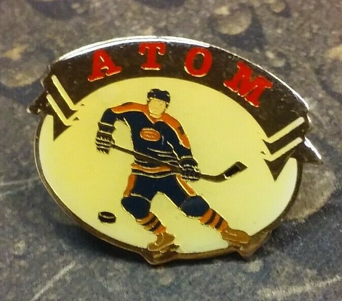 ATOM hockey player pin badge