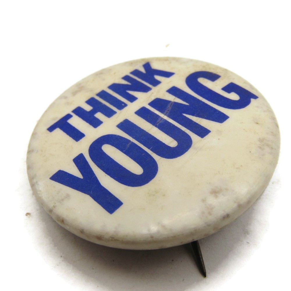 Vintage 1960s Think Young Slogan Pinback Button Blue on Cream White Celluloid