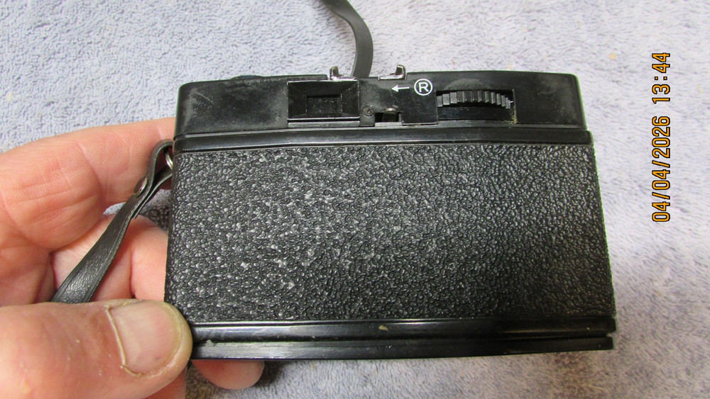 3 vintage cameras.
