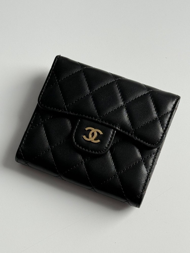 Chanel classic black caviar tri-fold wallet