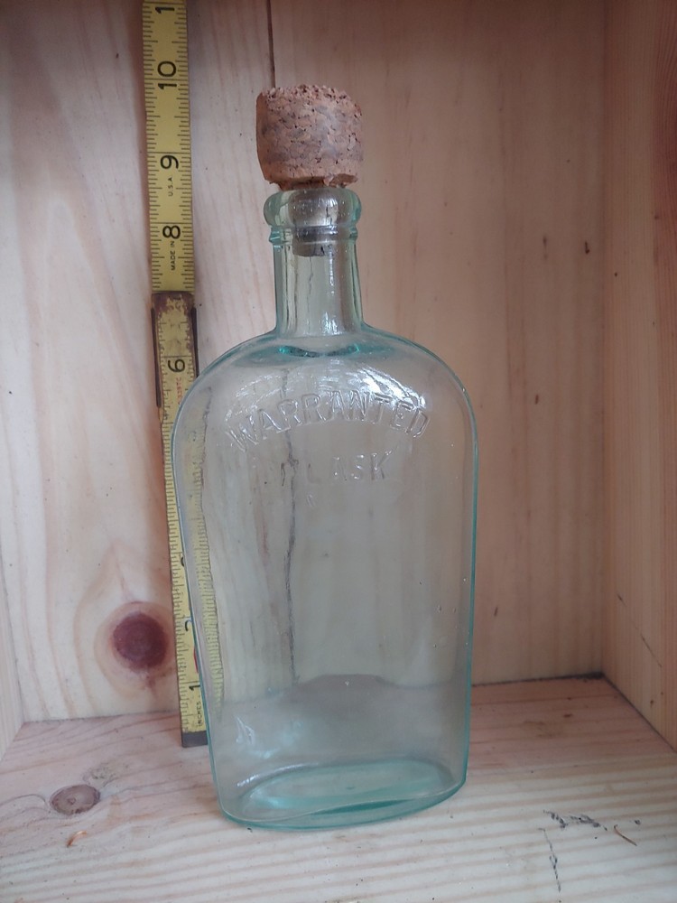 Antique Warranted Flask Blue glass  strap side Bottle