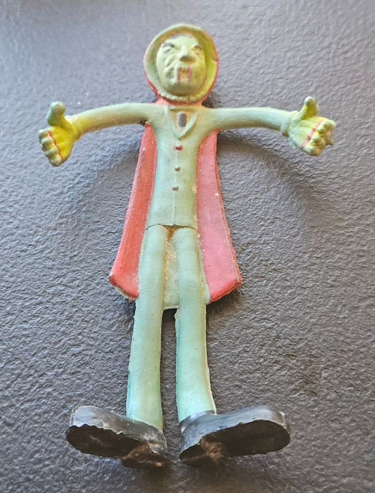 VAMPIRE / DRACULA GREEN / RED BENDABLE FIGURE.