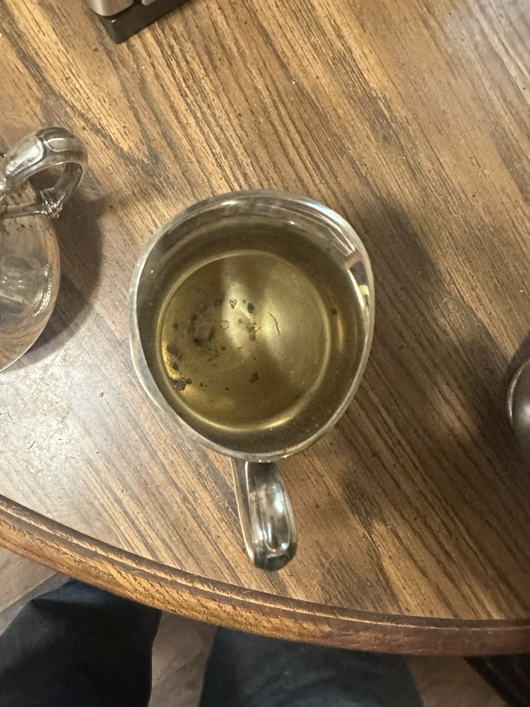 Set Of Four Silver Plated Cups.