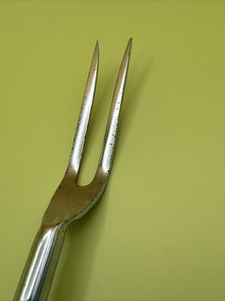 9.5” Vintage bakealite handled MCM meat Fork
