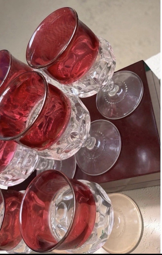Tiffin Glass Co. "King's Crown" ruby red flashed thumbprint goblets. Collection