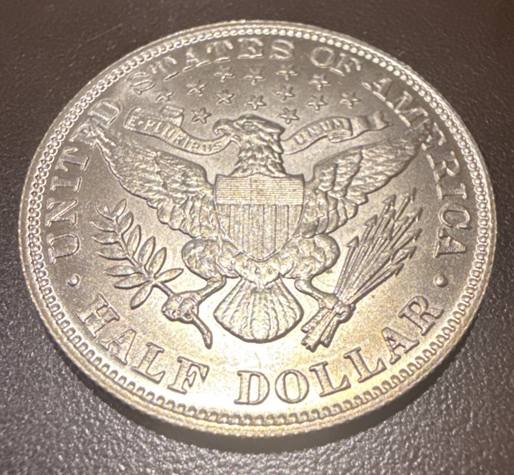 1916 Dan Carr Barber Half O/S on a Silver Barber Half- bulk Handled