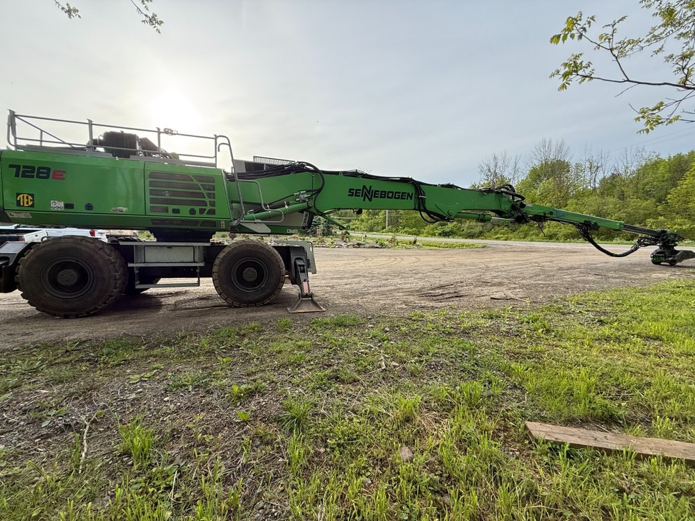2023 Sennebogen 728e wheeled tree care material handler